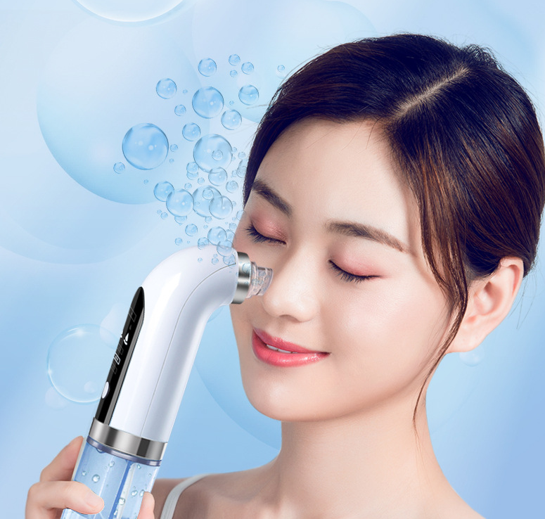 GlowVac™ blackhead remover vacuum being used on face for deep pore cleansing